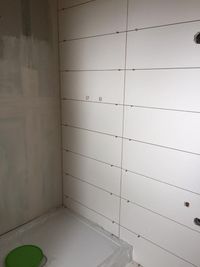 Tiling the bathroom upstairs